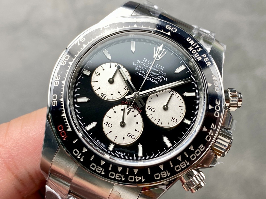 Luminous green dial Rolex replica with polished silver finish and jubilee bracelet
